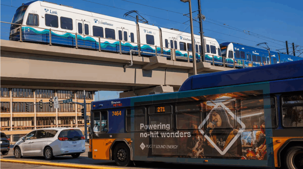A King County Metro bus approaches the Link Light Rail station